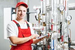 Technician maintenance repairman engineer inspecting heating system in boiler room Schlagwort(e): heating engineer, plumber, engineer, room, hvac, water, pressure, technician, workwear, guy, pipeline, repairman, worker, control, controlling, technology, inspector, inspection, data, equipment, system, gas, measuring, examining, checking, adjustment, operating, house, electrician, work, man, vessel, indicator, pipe, valve, thermostat, pump, fix, setting, manometer, circulation, boiler, industrial, maintenance, faucet, industry, heating, laborer, craftsman, heating engineer, plumber, engineer, room, hvac, water, pressure, technician, workwear, guy, pipeline, repairman, worker, control, controlling, technology, inspector, inspection, data, equipment, system, gas, measuring, examining, checking, adjustment, operating, house, electrician, work, man, vessel, indicator, pipe, valve, thermostat, pump, fix, setting, manometer, circulation, boiler, industrial, maintenance, faucet, industry, heating, laborer, craftsman